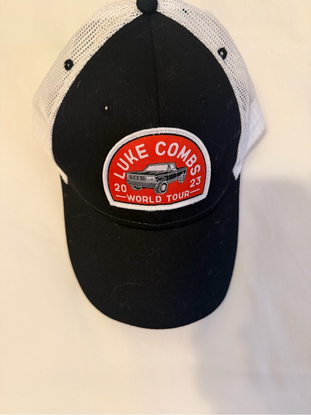 Black & White Mesh Luke Combs Trucker Hat with Red Patch